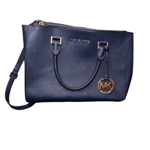 Navy Michael Kors crossbody bag with matching bifold wallet